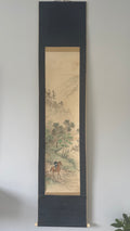 Vertical traditional artwork of a horse in a natural setting, framed in black on a white wall.