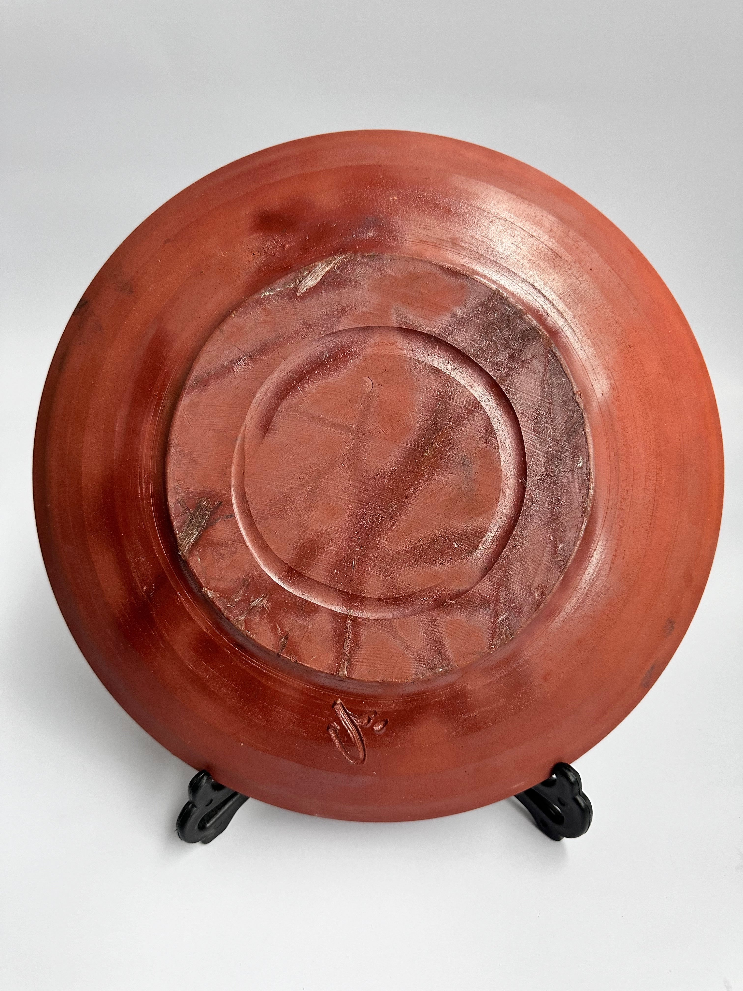 Back of vintage Bizen botamochi plate with natural wood-fired gradients and unglazed yakishime clay