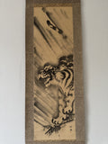 Traditional Japanese artwork of a tiger on a textured paper background