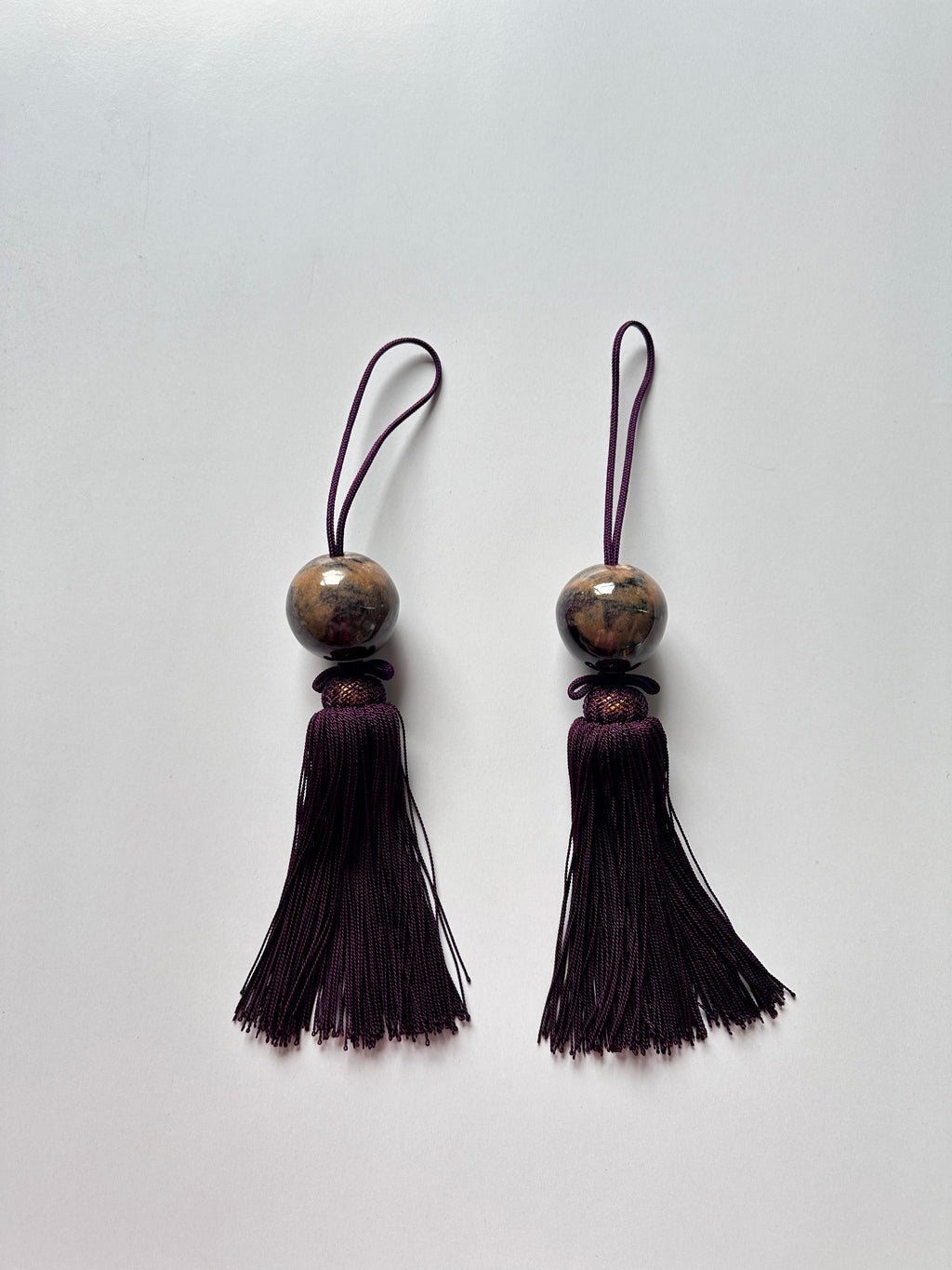 Natural Stone Fūchin with Burgundy Tassels – Japanese Scroll Weight Pair, Earth-Tone Marble Sphere