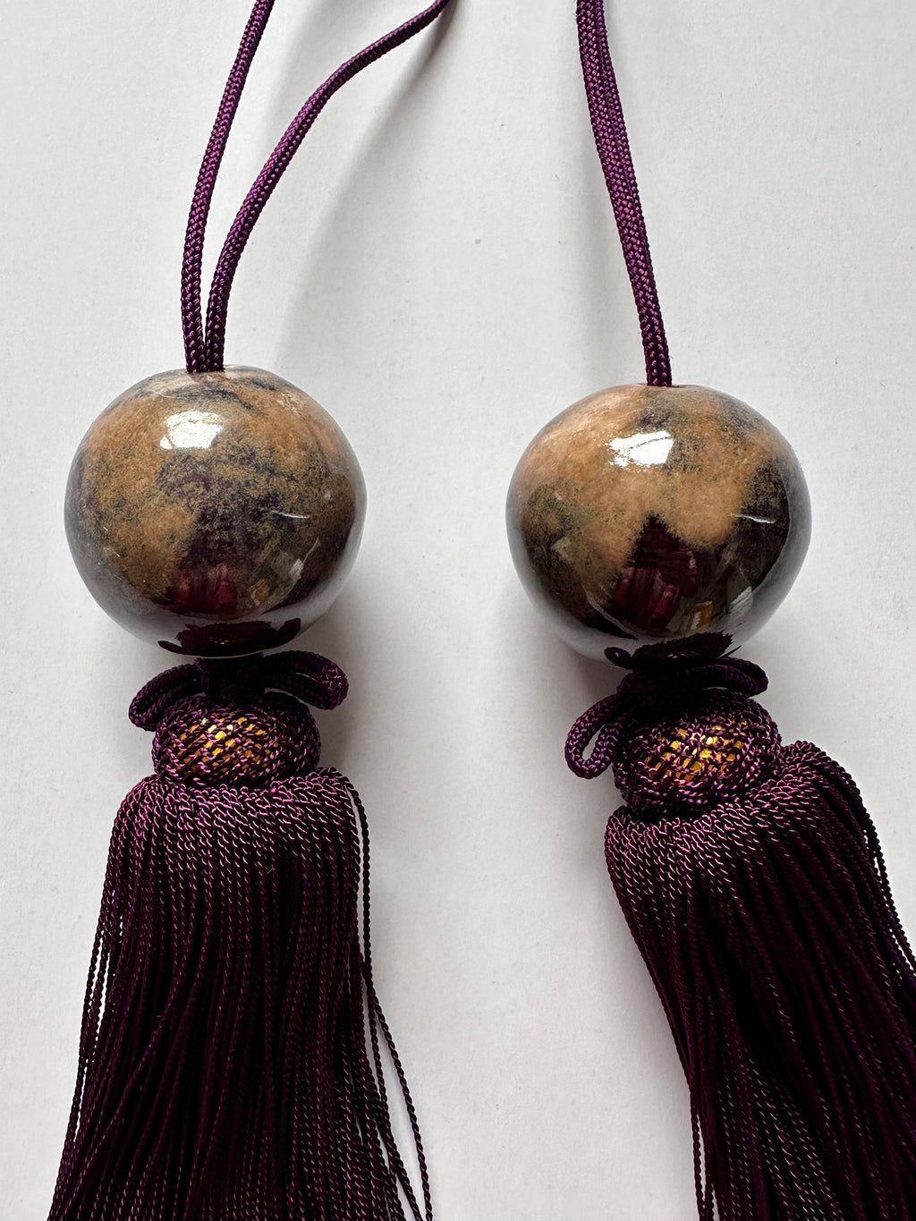 Natural Stone Fūchin with Burgundy Tassels – Japanese Scroll Weight Pair, Earth-Tone Marble Sphere