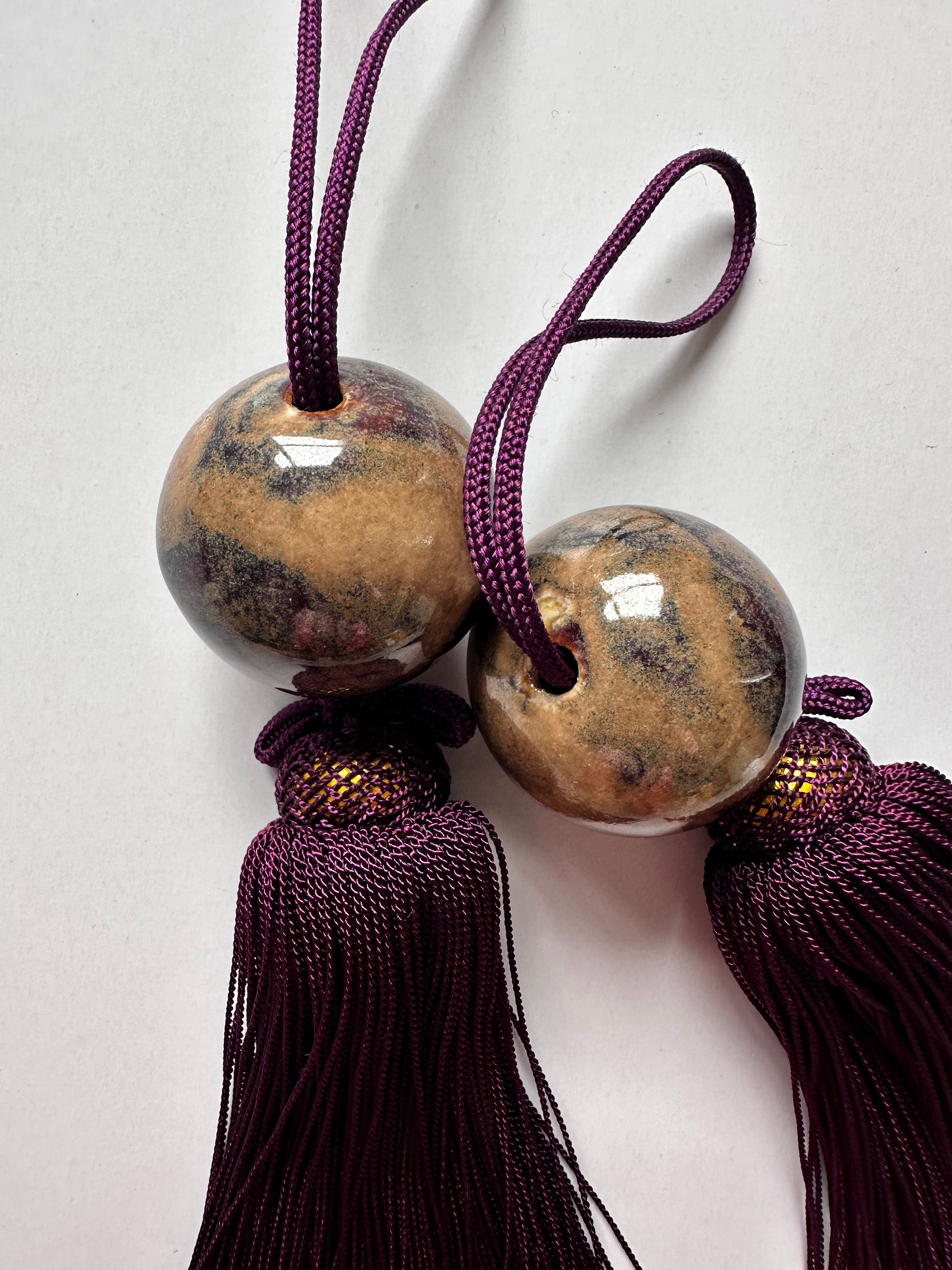 Natural Stone Fūchin with Burgundy Tassels – Japanese Scroll Weight Pair, Earth-Tone Marble Sphere