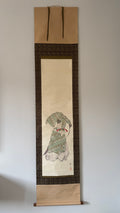 Traditional Japanese scroll with a woman holding an umbrella on a plain background