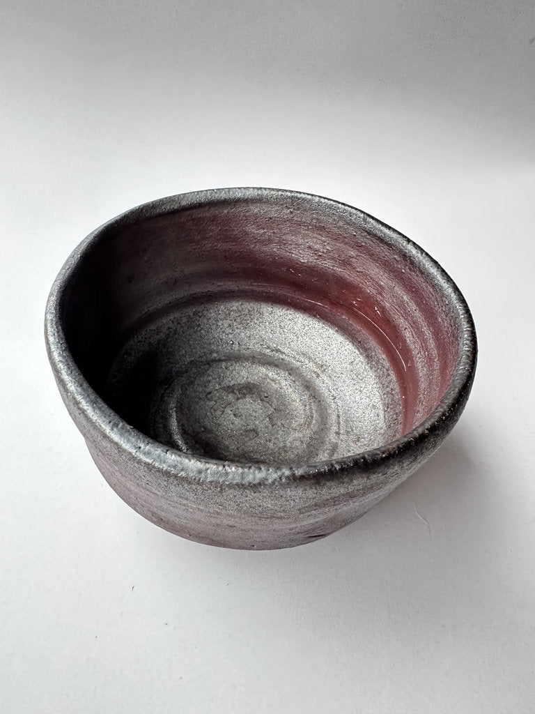 Ceramic bowl with a two-tone design on a white background