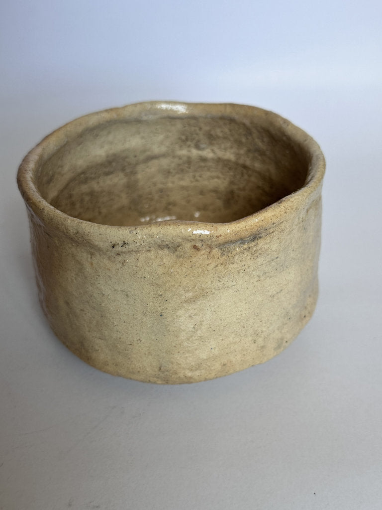 Clay pot on a plain background