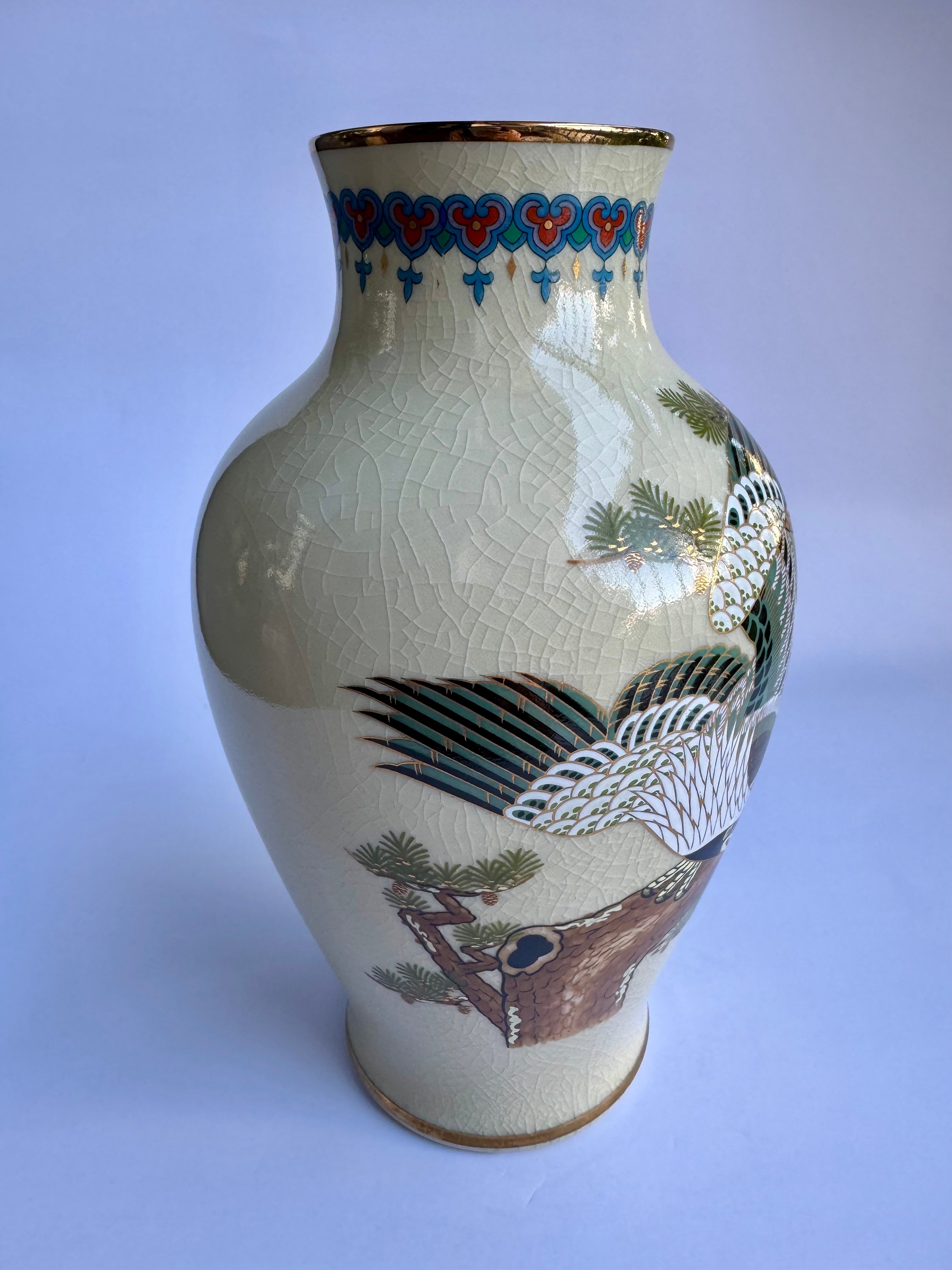 Decorative vase with intricate patterns on a white background