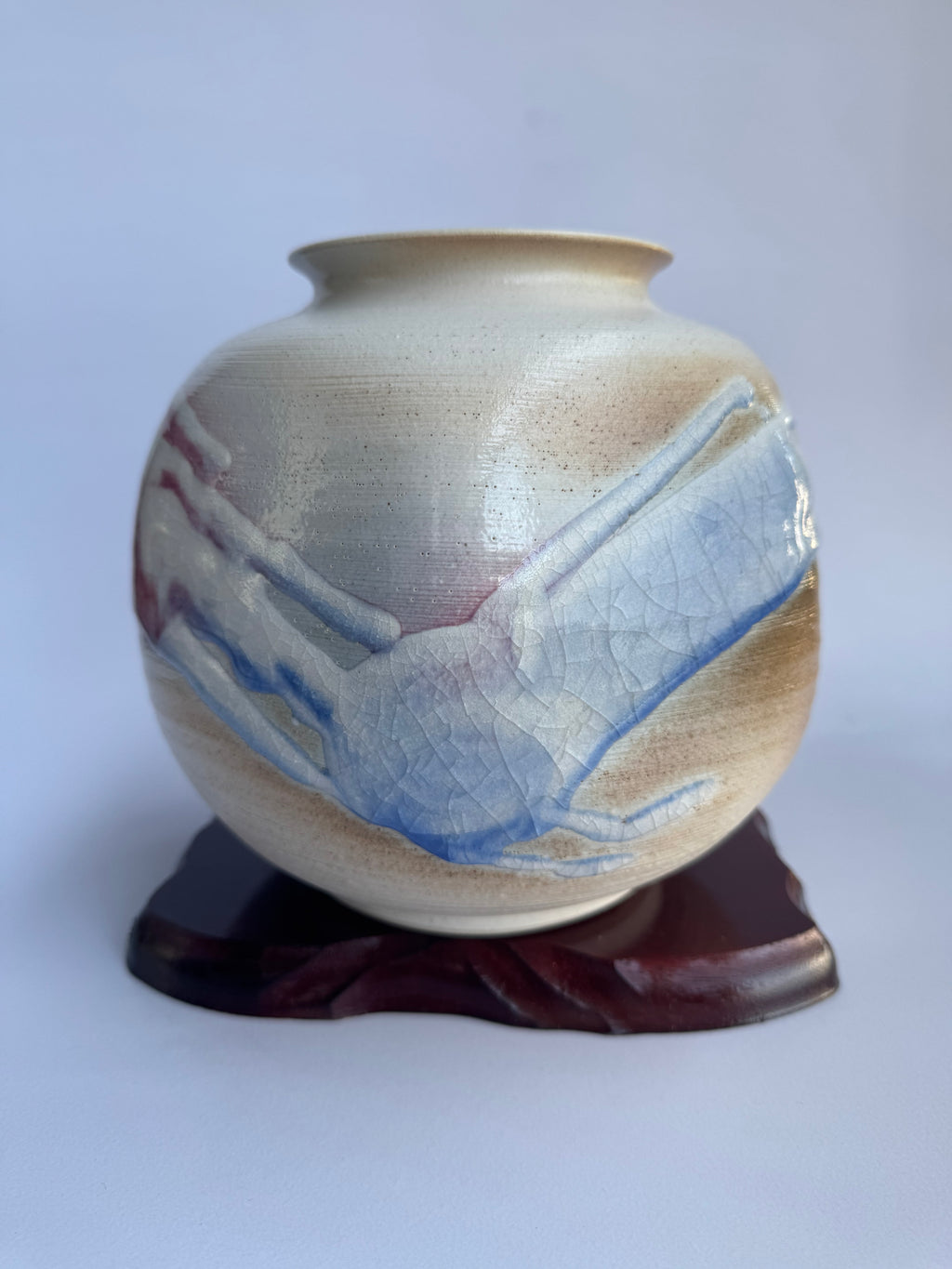 “Close-up crackle glaze texture on Fujiwara Kyoto vase.”