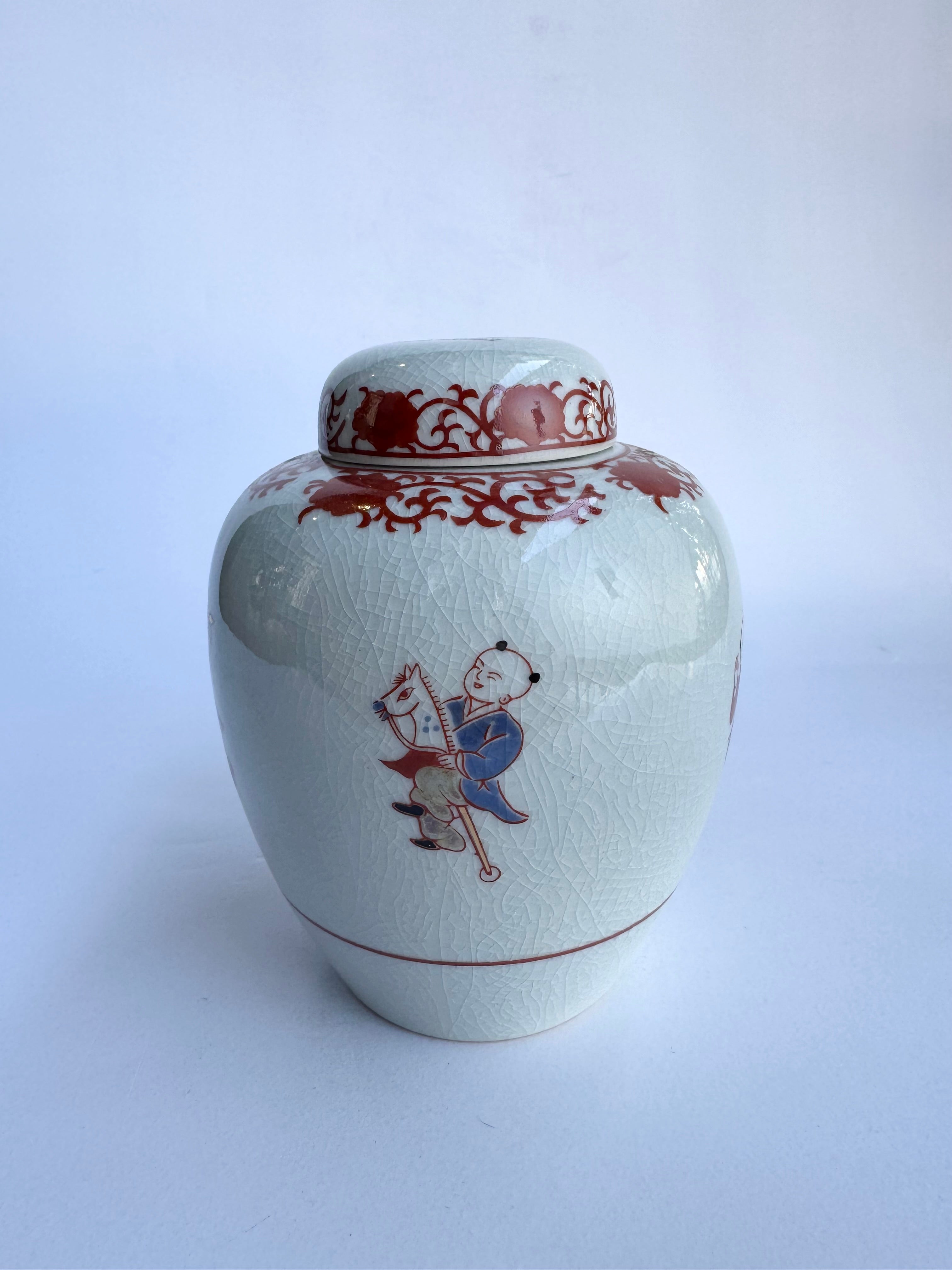 Ceramic jar with decorative lid and character illustration on a white background