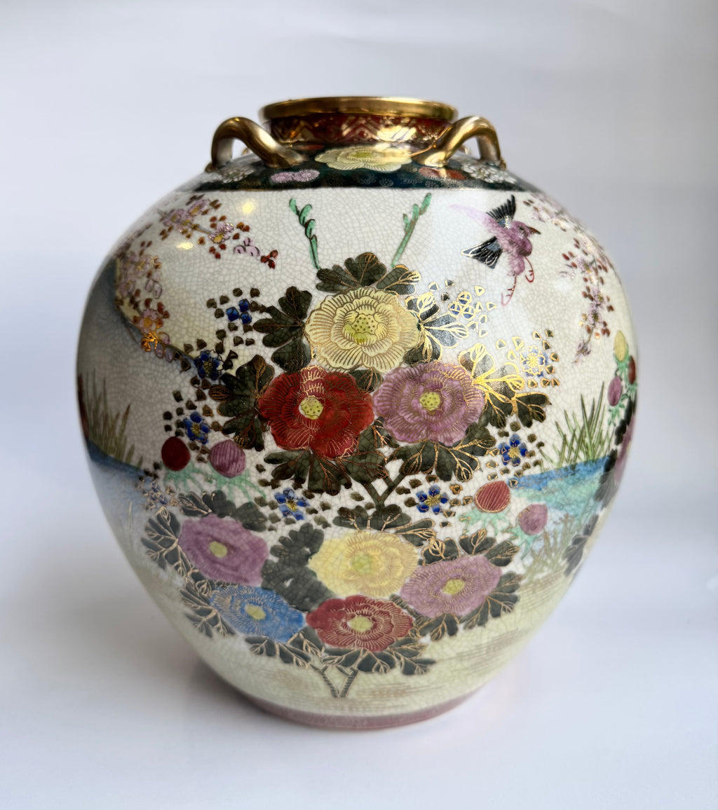 Decorative vase with floral patterns on a white background