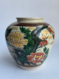 Decorative ceramic jar with floral patterns 