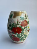 Decorative ceramic vase with floral patterns 