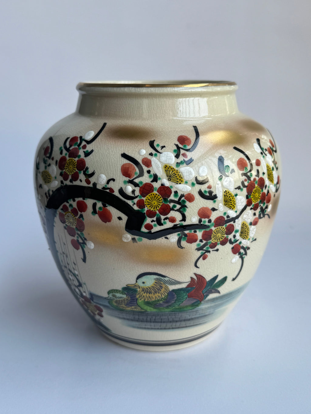 Ceramic vase with floral and bird design 