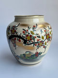 Ceramic vase with floral and bird design 