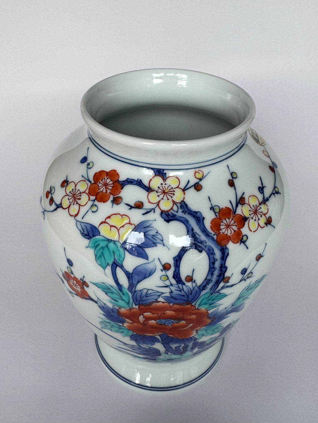 Arita Japanese Porcelain Vase – Hand-Painted Red & Blue Floral Design on White Glaze