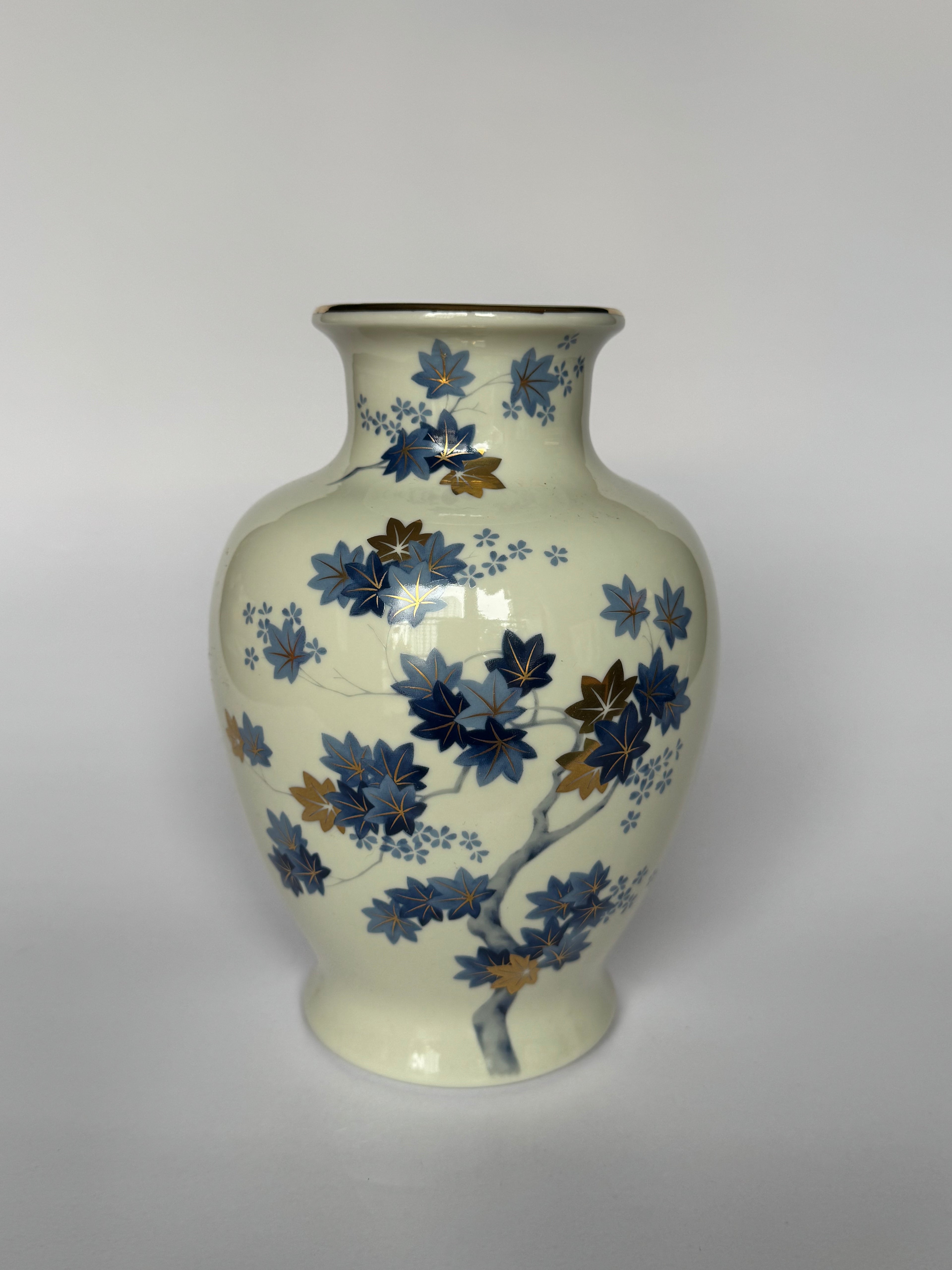 Decorative vase with floral patterns on a white background