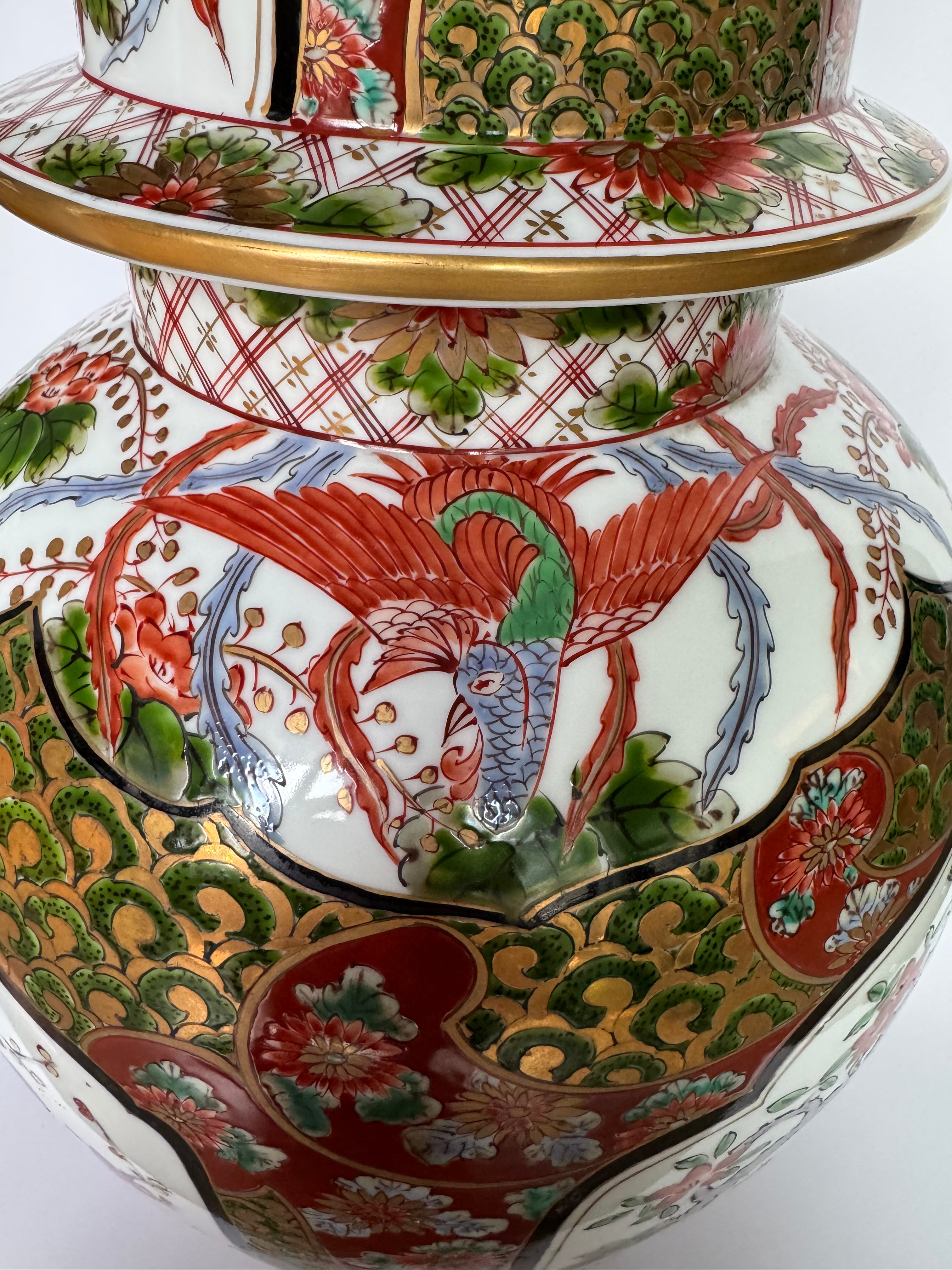 Japanese Arita Ginger Jar – Red & Gold Porcelain with Geisha Artwork and Gilded Lion Finial