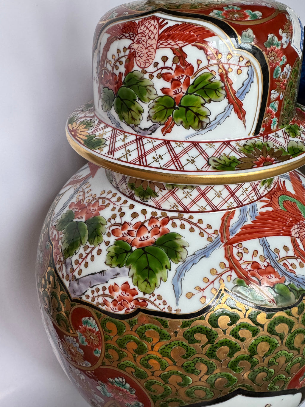 Japanese Arita Ginger Jar – Red & Gold Porcelain with Geisha Artwork and Gilded Lion Finial
