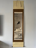 Traditional Japanese scroll with winter scene and snowflakes on a plain background
