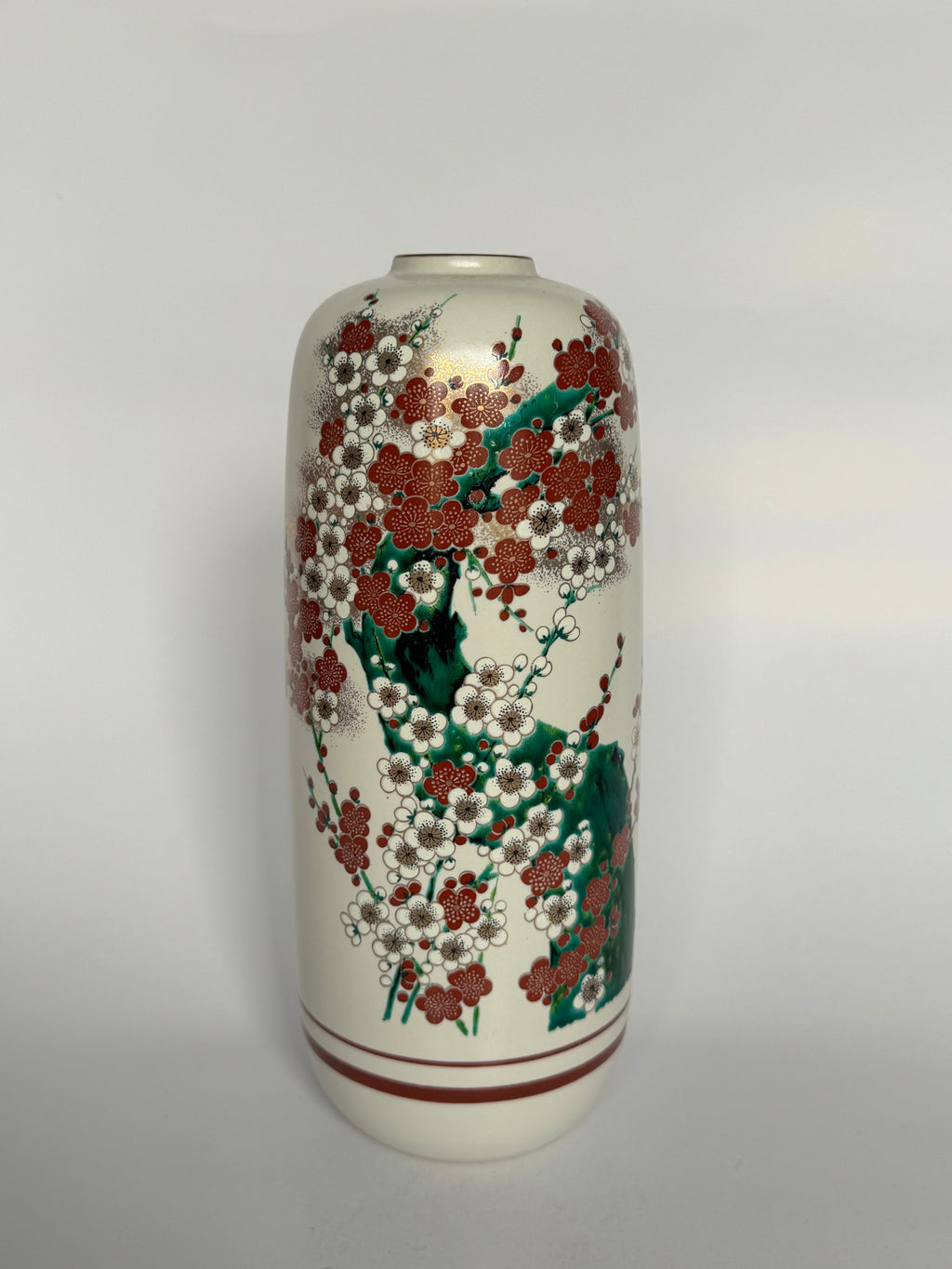 Decorative vase with floral patterns on a white background