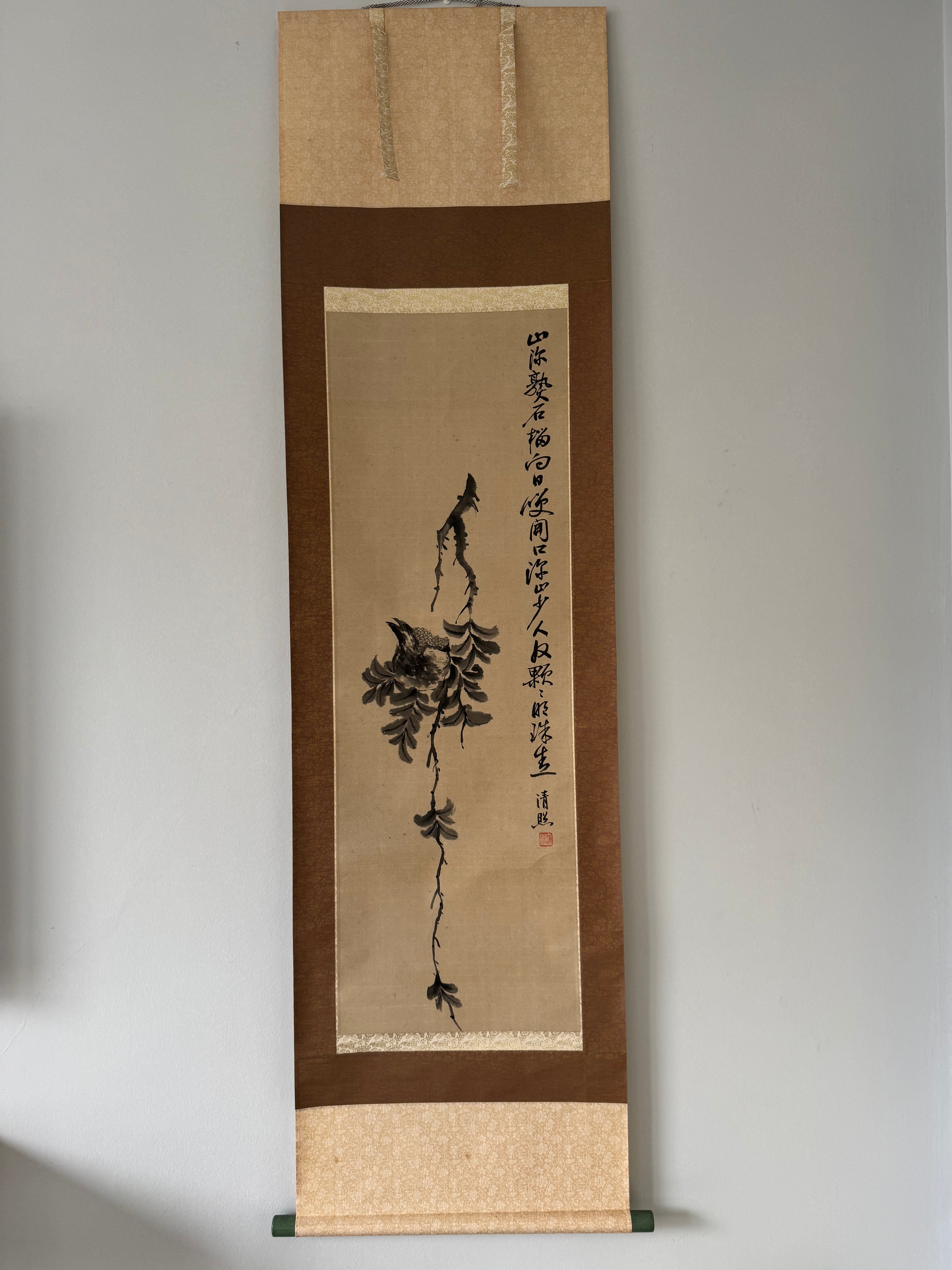 Vertical scroll with ink painting and calligraphy on a plain background