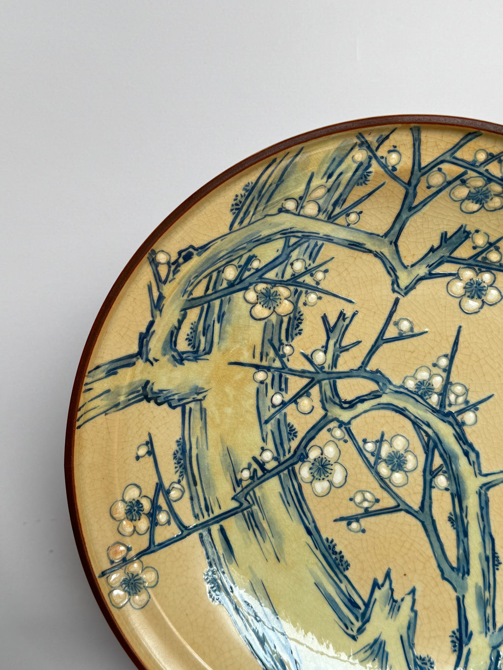 Kutani Decorative Plate – Hand Painted Blue Plum Blossoms on Yellow Glaze