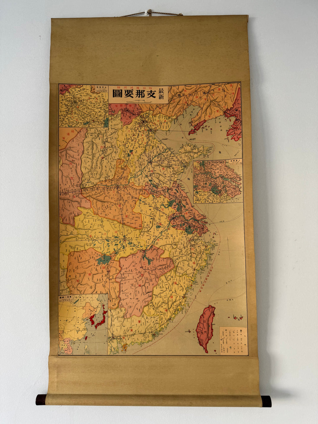 Vintage map on a roll with a beige background