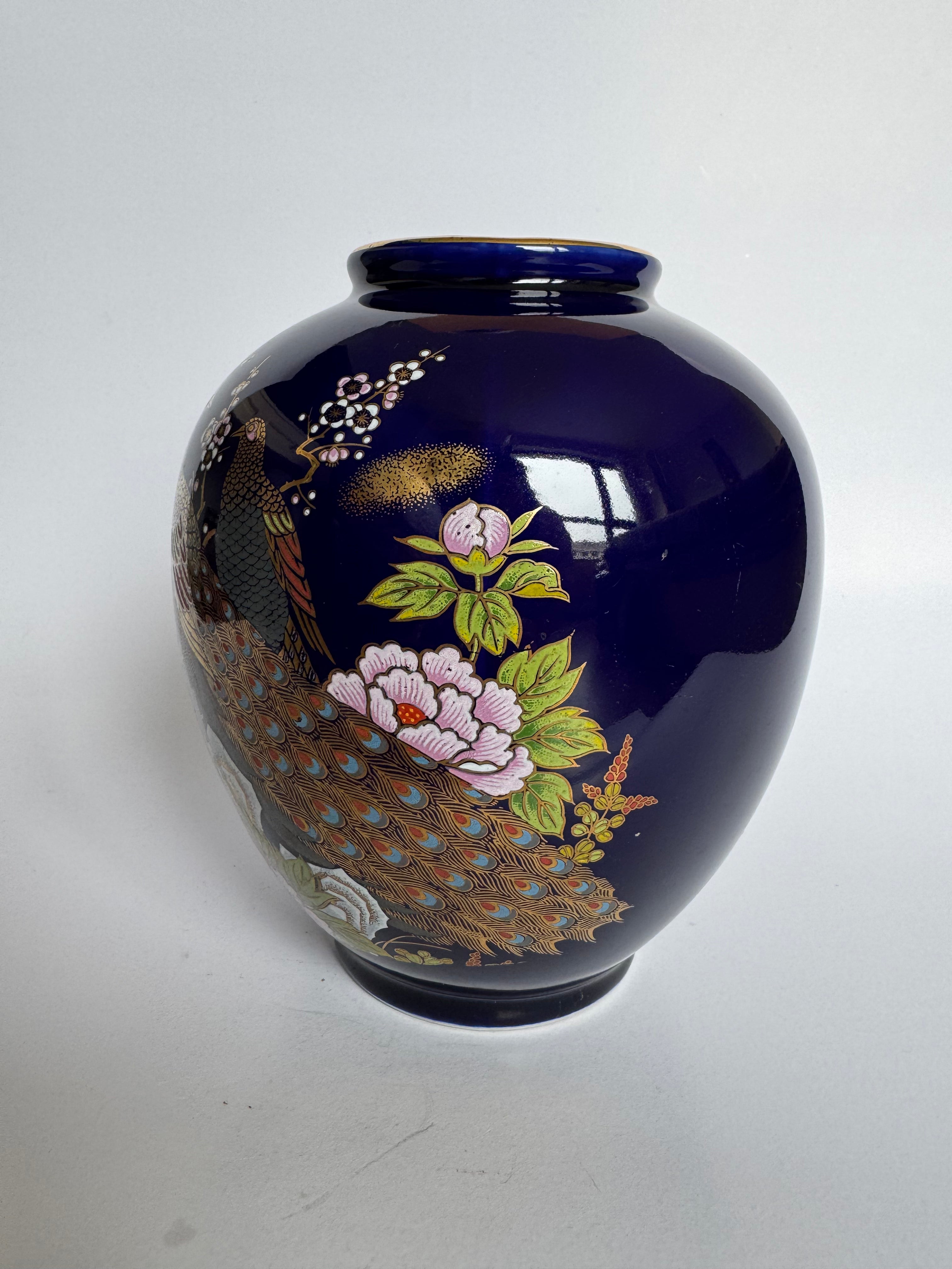 Decorative vase with floral patterns on a white background