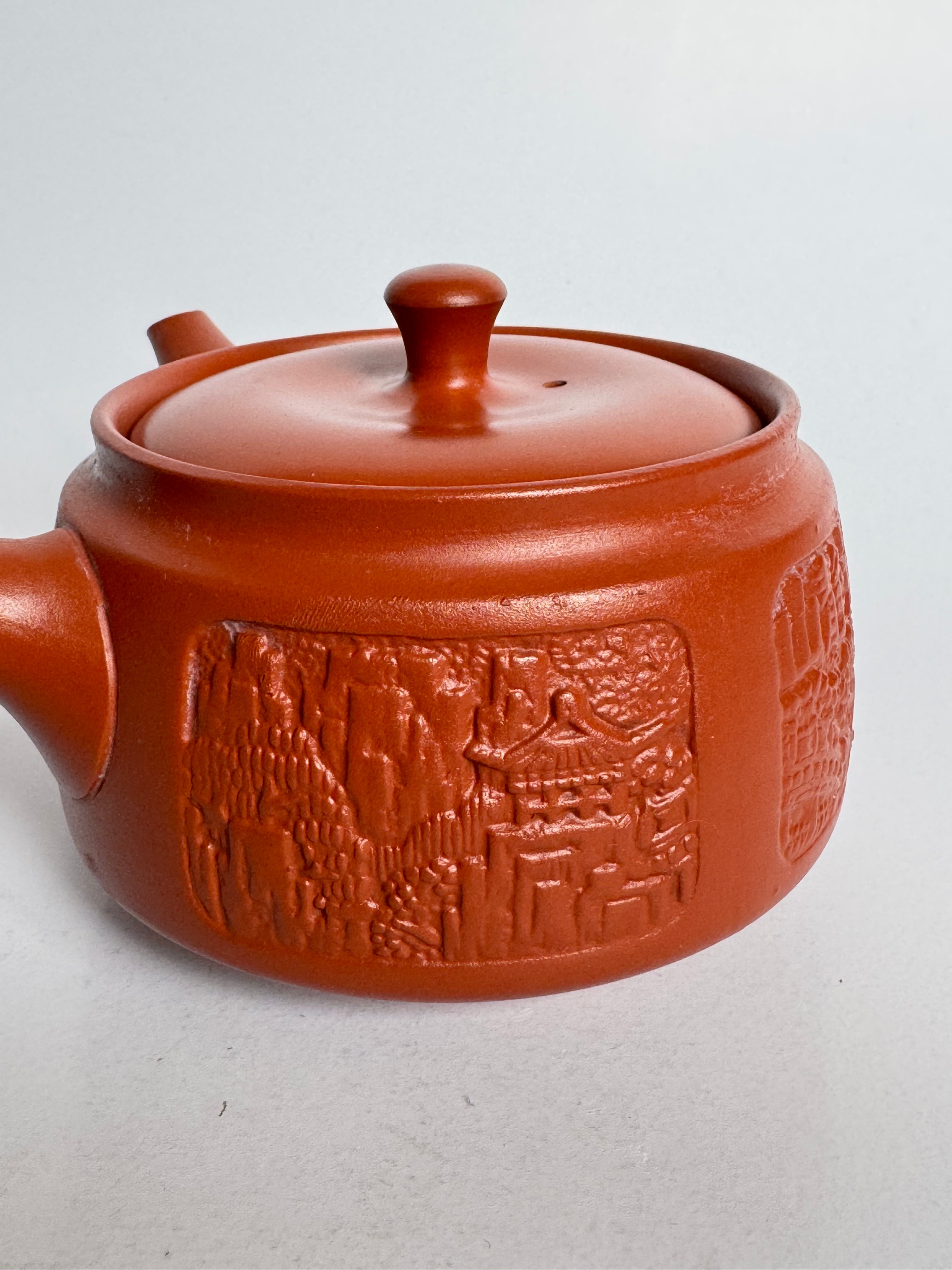 Vintage Tokoname Teapot with Carved Landscape Scene – Japanese Red Clay Kyusu