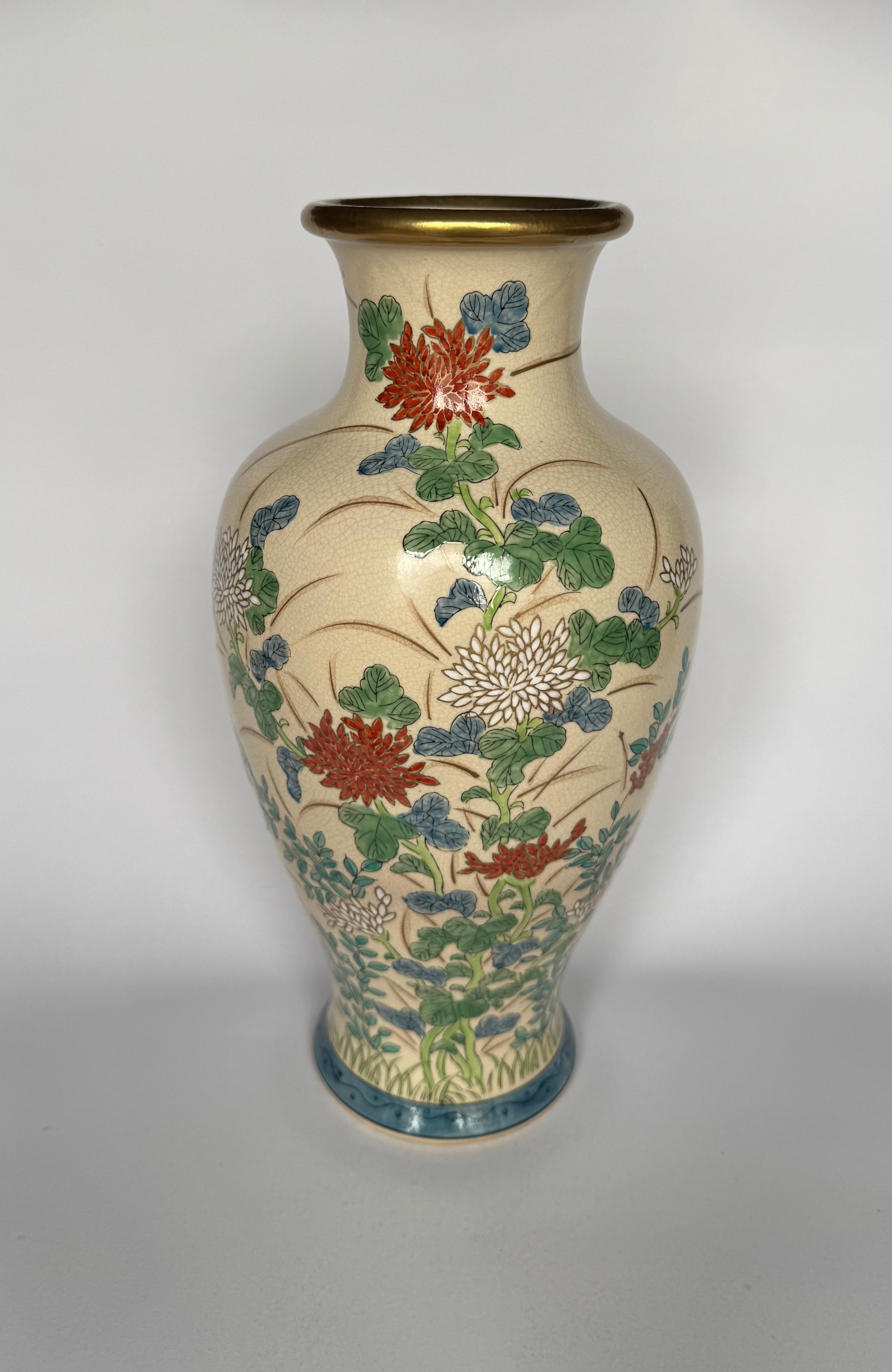 Decorative vase with floral patterns on a plain background
